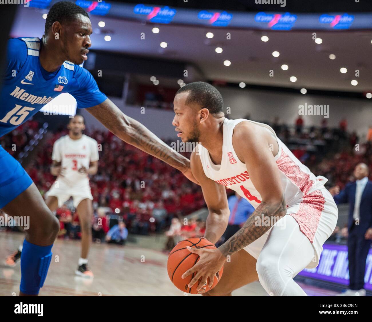 March 8, 2020: Houston Cougars forward Justin Gorham (4) is defended by Memphis Tigers forward Lance Thomas (15) in the NCAA basketball game between the Memphis Tigers and the Houston Cougars at the Fertitta Center in Houston, Texas. Houston defeated Memphis 64-57. Prentice C. James/CSM Stock Photo