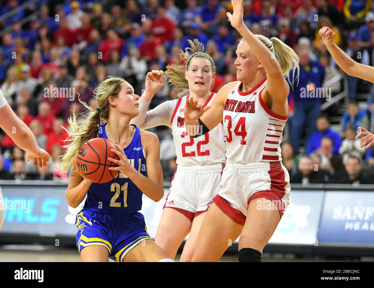 March 10, 2020: South Dakota Coyotes center Hannah Sjerven (34) guards South Dakota State Jackrabbits guard Tylee Irwin (21) during the Summit League women's championship basketball game between the South Dakota State Jackrabbits and the South Dakota Coyotes at the Denny Sanford Premier Center, Sioux Falls, SD. South Dakota defeated South Dakota State 63-58 and move on to the NCAA tournament. Photo by Russell Hons/CSM Stock Photo