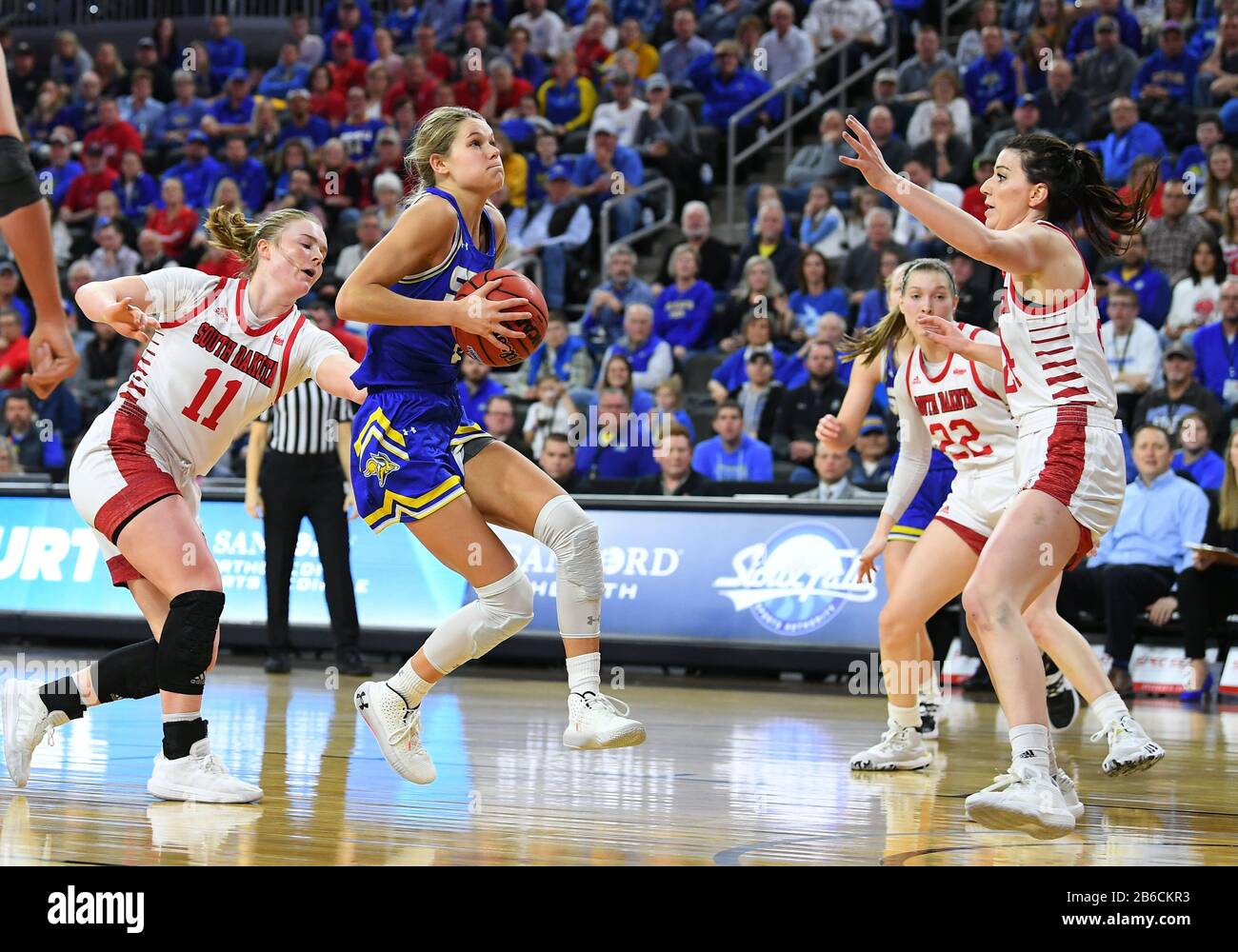 March 10, 2020: South Dakota State Jackrabbits guard Tylee Irwin (21) goes up for a shot during the Summit League women's championship basketball game between the South Dakota State Jackrabbits and the South Dakota Coyotes at the Denny Sanford Premier Center, Sioux Falls, SD. South Dakota defeated South Dakota State 63-58 and move on to the NCAA tournament. Photo by Russell Hons/CSM Stock Photo