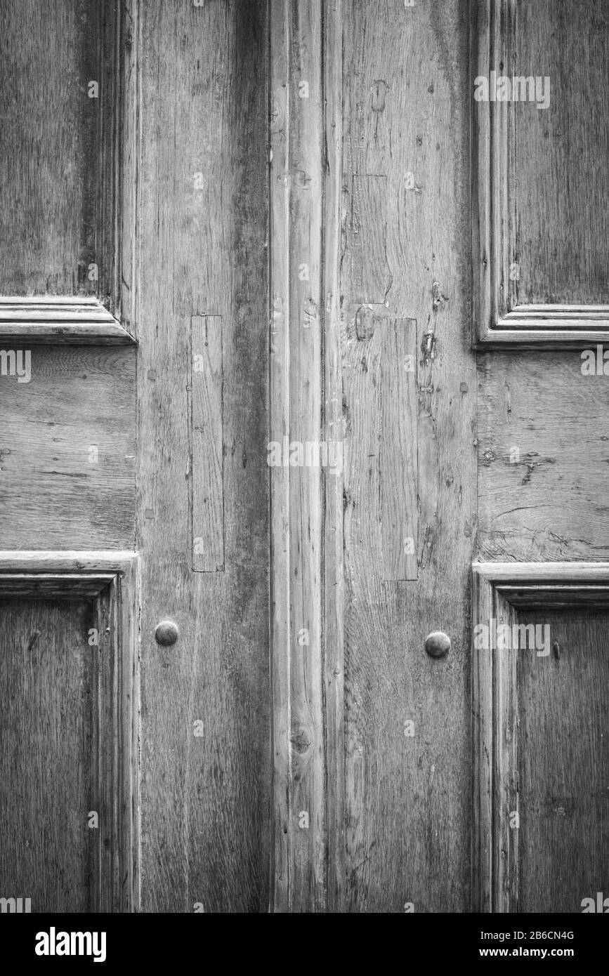 Historic heavy wood doors Black and White Stock Photos & Images - Alamy