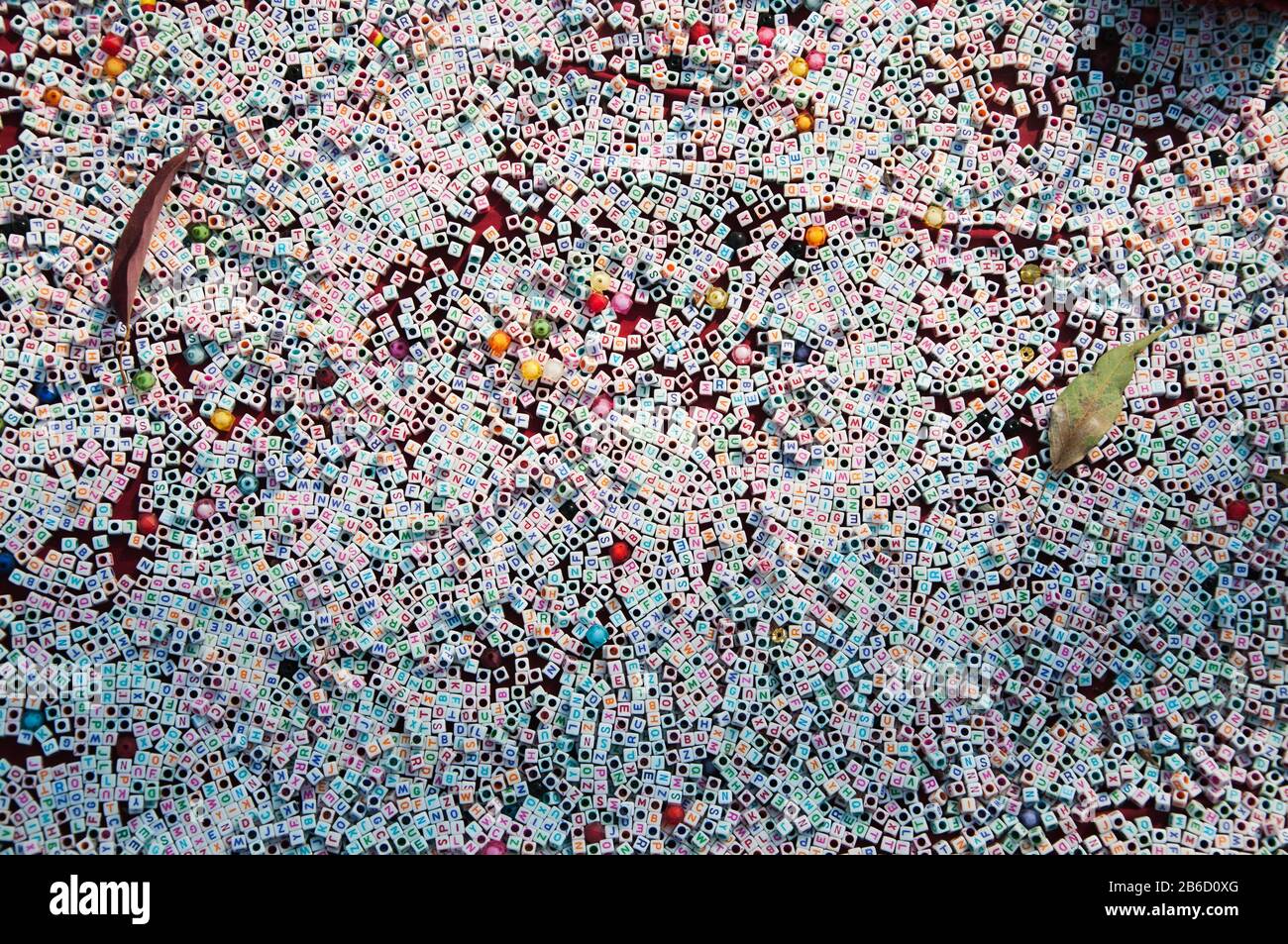 English alphabet beads with accessories Stock Photo Alamy