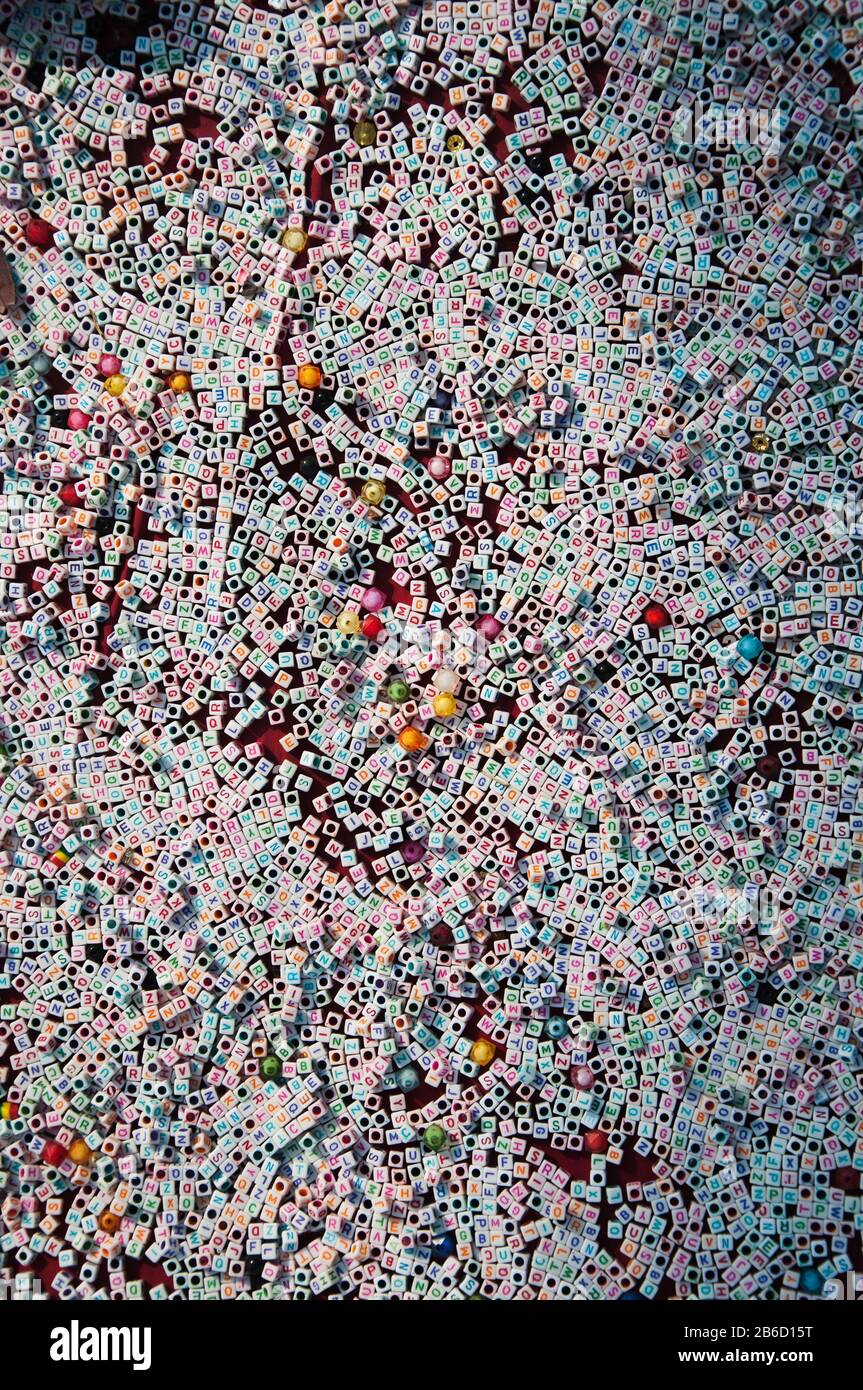 English alphabet beads with accessories Stock Photo Alamy