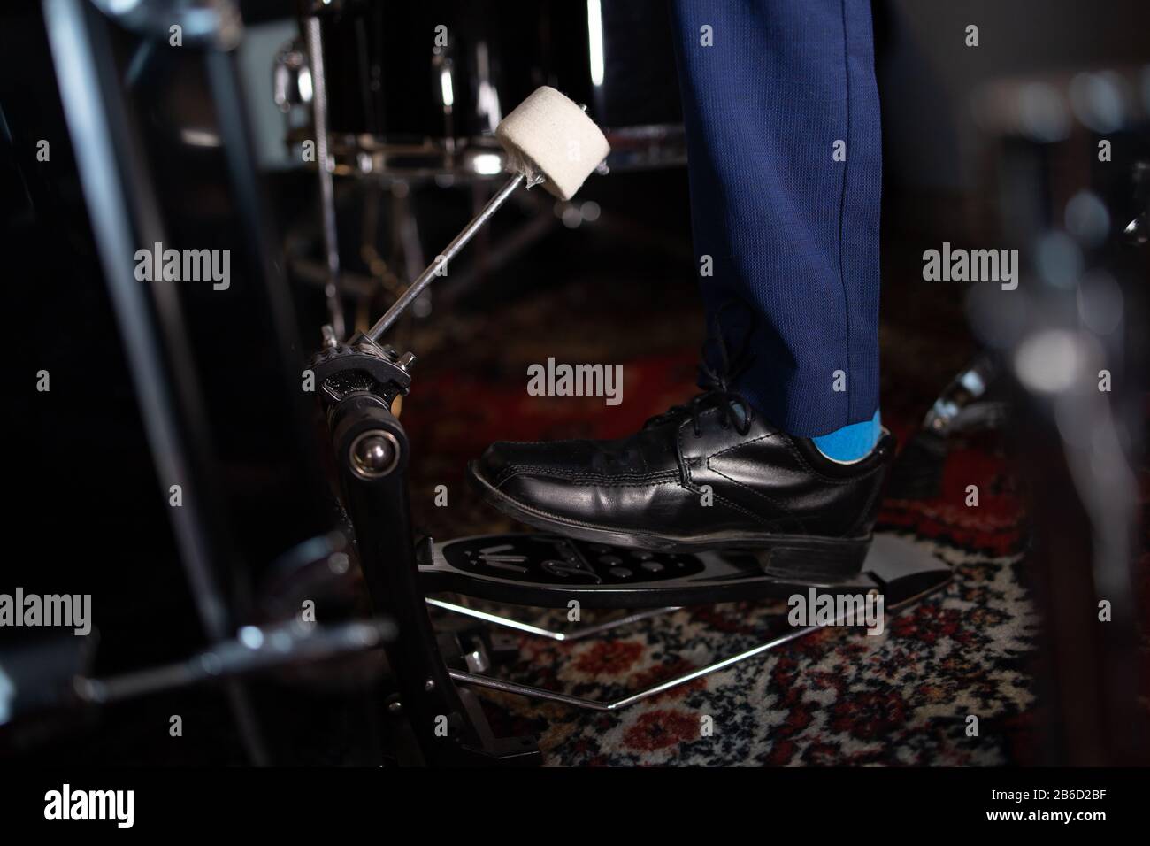 Musical instruments played by striking with the hand or with hires