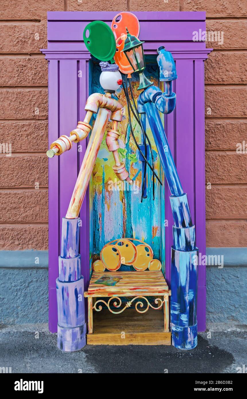 Colorful and funny composition of plastic plumbing pipes reminiscent of ...