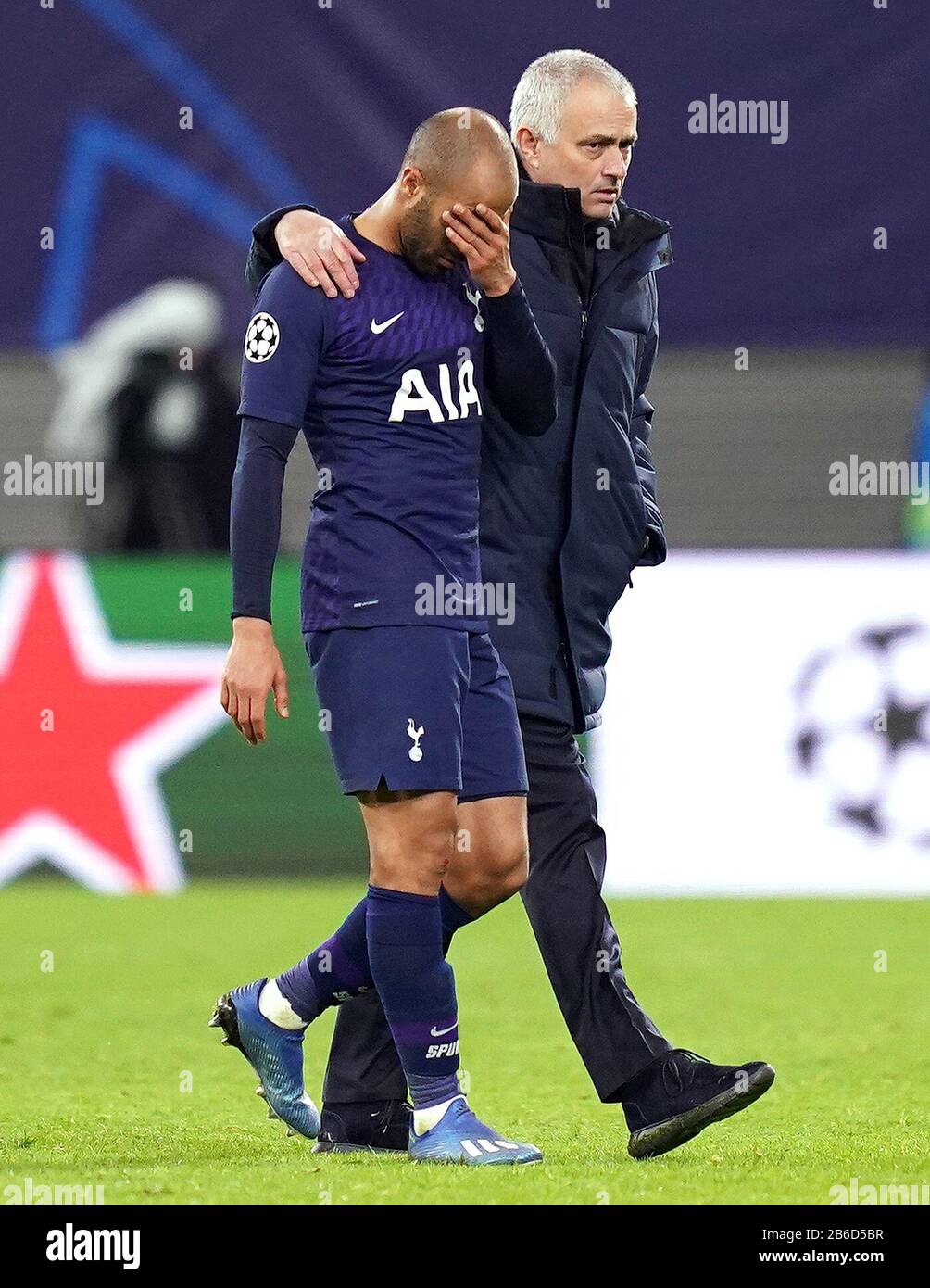 Tottenham Hotspur's Lucas Moura (left) and manager Jose Mourinho appear dejected after the final whistle at the UEFA Champions League round of 16 second leg match at the Red Bull Arena, Leipzig. Stock Photo