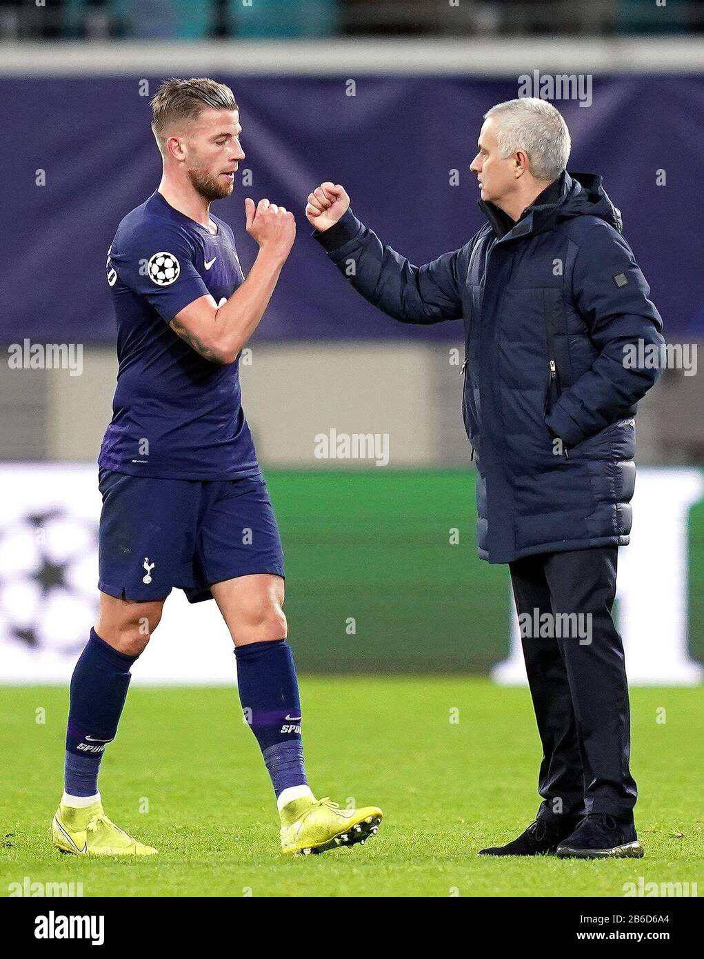 Tottenham Hotspur's Toby Alderweireld (left) and manager Jose Mourinho appear dejected after the final whistle at the UEFA Champions League round of 16 second leg match at the Red Bull Arena, Leipzig. Stock Photo