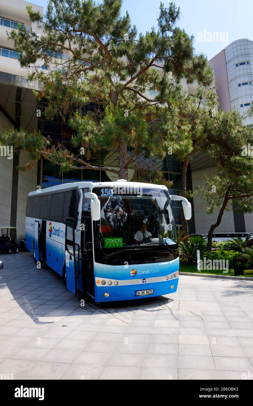 ANTALYA, TURKEY - APRIL 25: The modern bus for tourists transportation is near entrance to hotel on April 25, 2014 in  Antalya, Turkey. More then 36 m Stock Photo