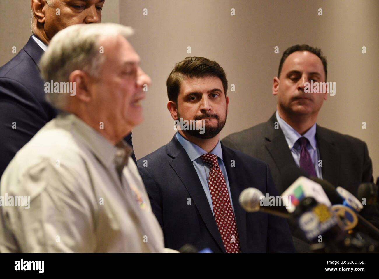 Hackensack, USA. 10th Mar, 2020. Mayor of Little Ferry Mauro Raguseo listens as Bergen County Executive Jim Tedesco speaks on the recent developments in connection with COVID-19 during a news conference at Two Bergen County Plaza in Hackensack on 03/30/20. Tedesco Presser (Photo by Mitsu Yasukawa/ Northjersey.com/Imagn/USA Today Network/Sipa USA) Credit: Sipa USA/Alamy Live News Stock Photo