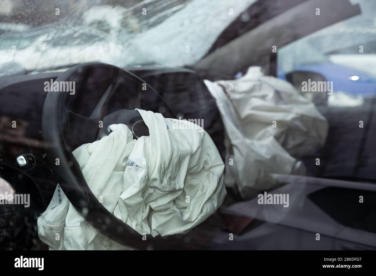 Exploded and destroyed airbags caused by an traffic accident Stock Photo