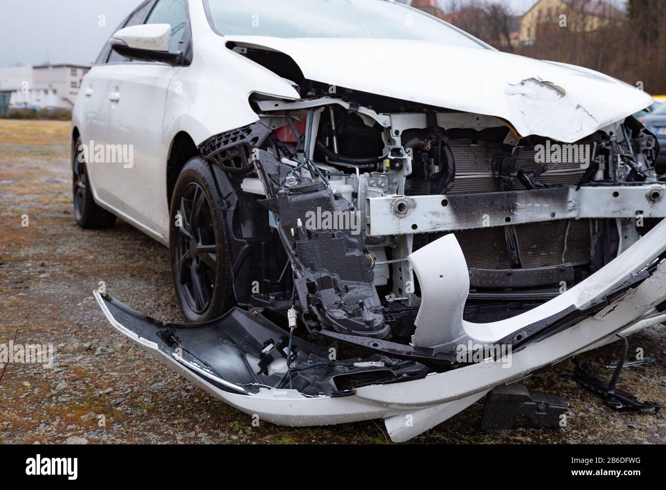 Damaged front of a car caused by an accident Stock Photo