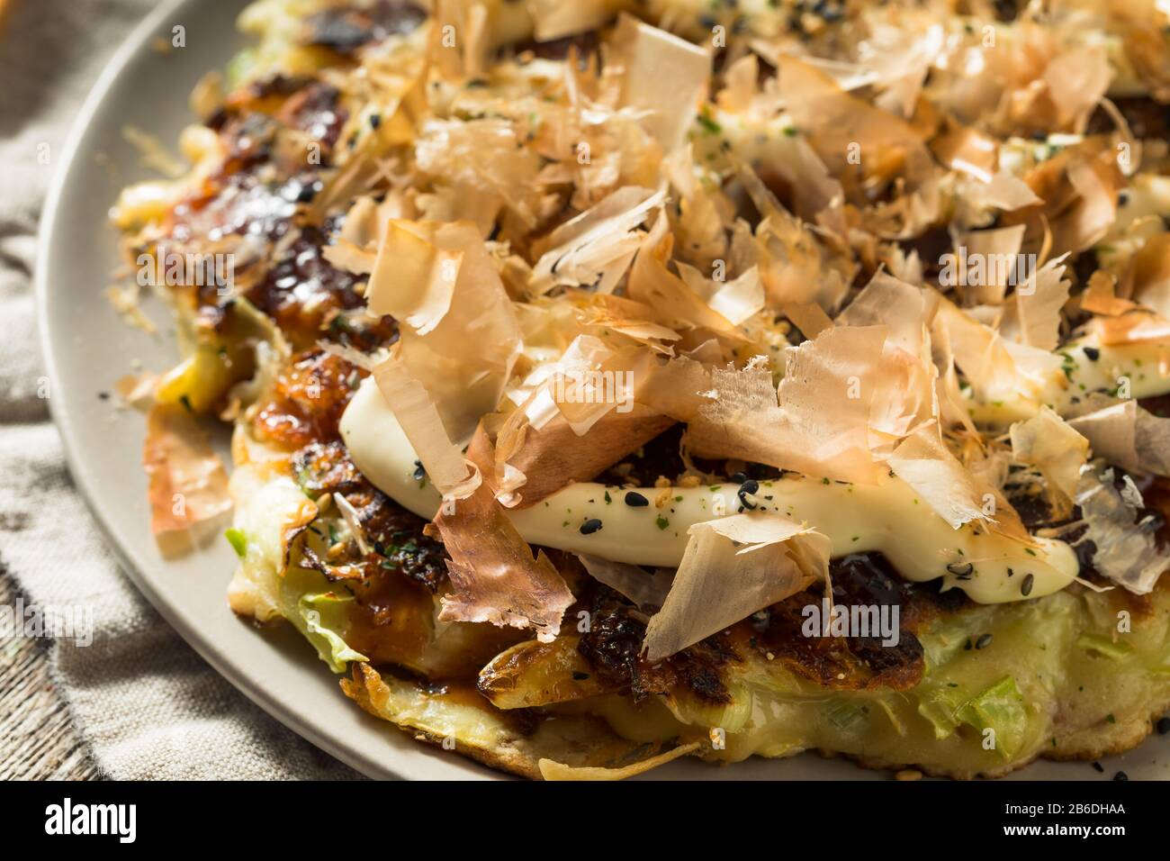 Homemade Japaense Okonomiyaki Cabbage Pancake with Mayo and Bonito Stock Photo