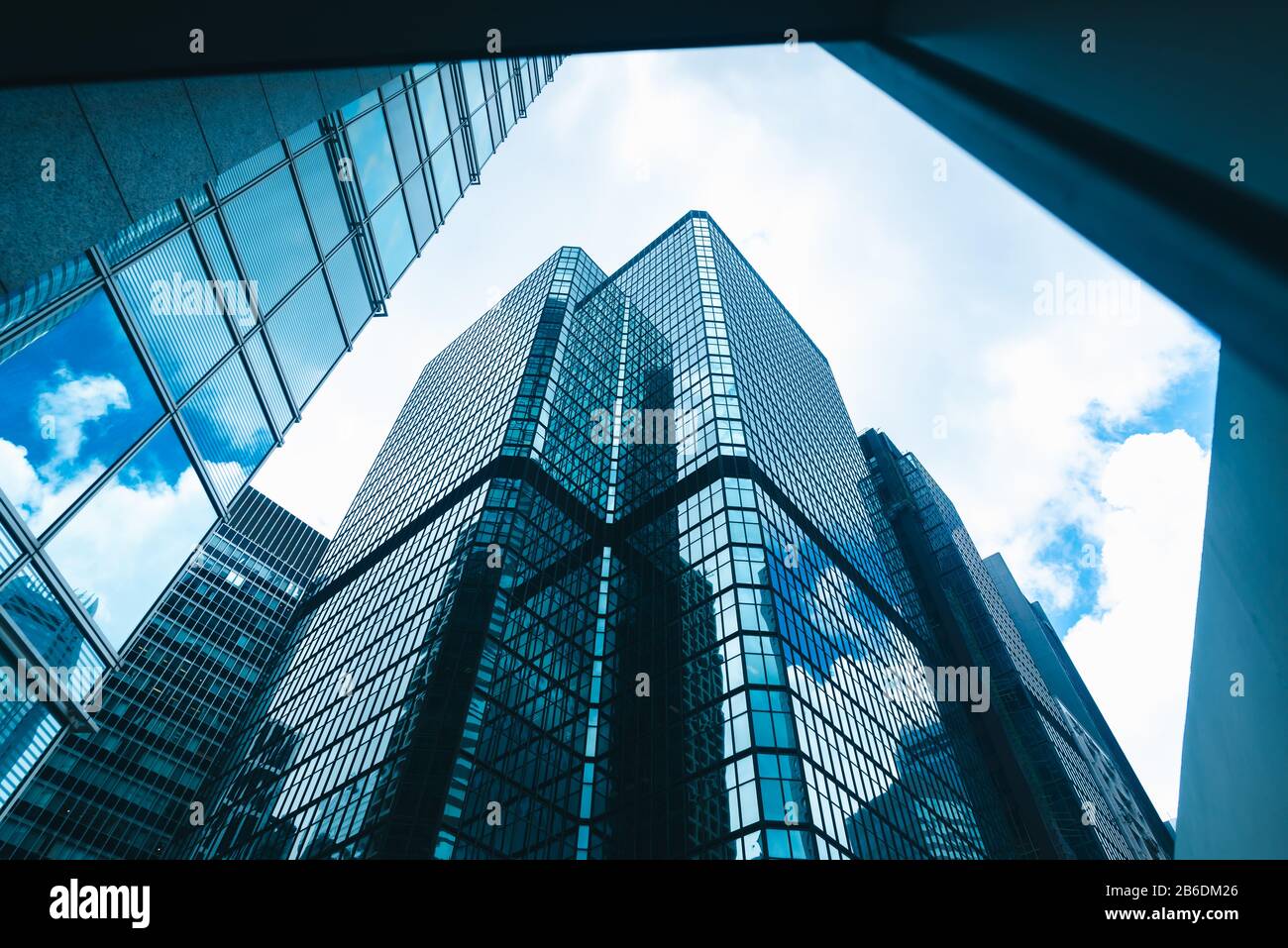 skyscraper building in Hong Kong, city view in blue filter Stock Photo ...