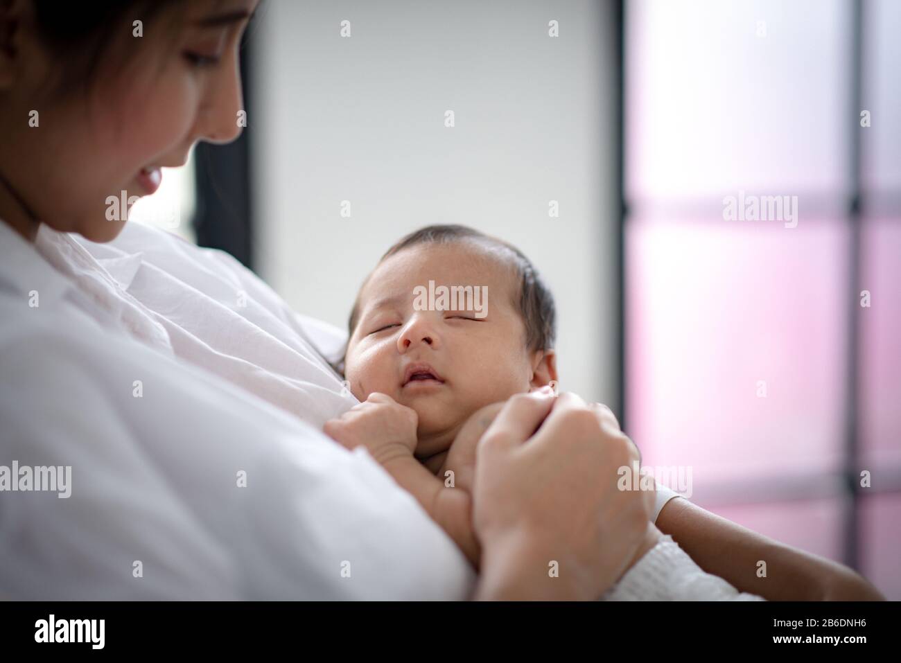 baby sleeping on soft mattress