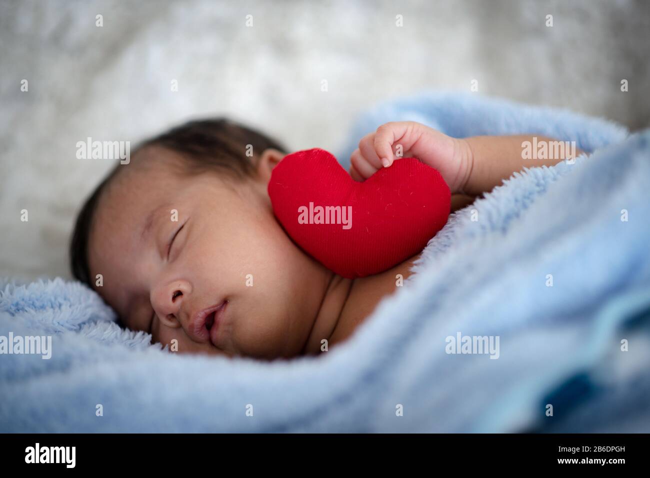 baby sleeping on soft mattress