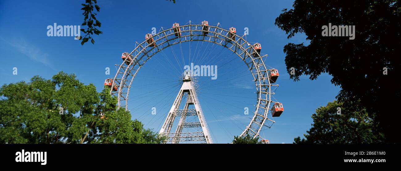 Ferris wheel in an amusement park, Prater Park, Vienna, Austria Stock Photo