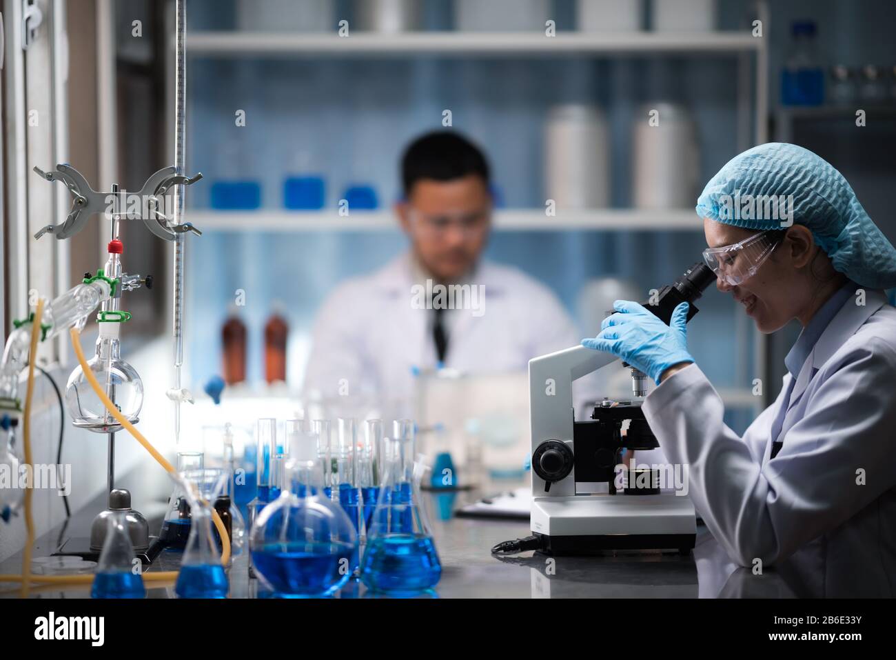 Health care researchers working in life science laboratory Stock Photo