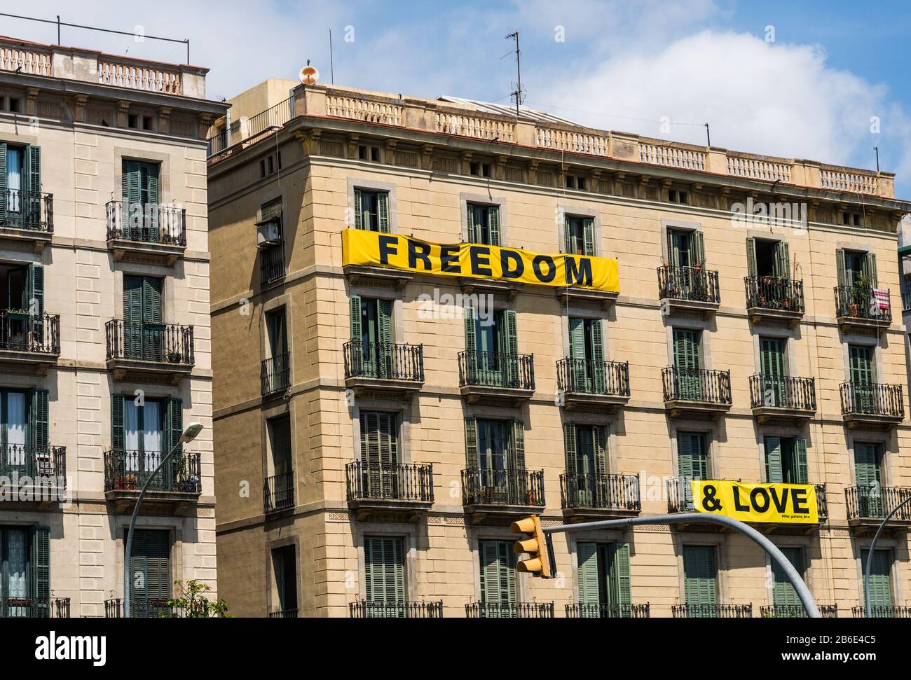 Barcelona, Spain - July 31, 2019: Houses with Freedom and Love signs Stock Photo
