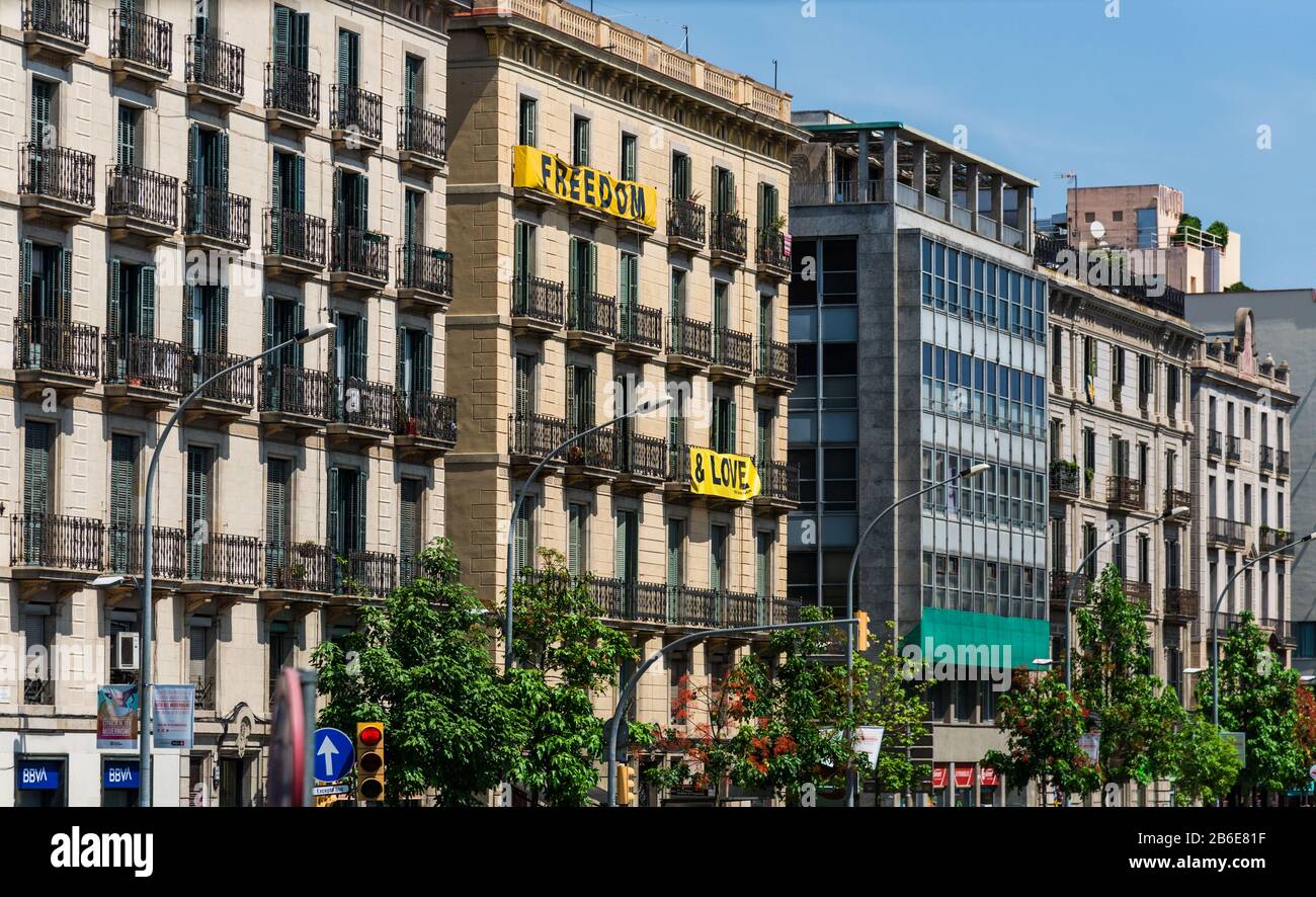 Barcelona, Spain - July 31, 2019: Houses with Freedom and Love signs Stock Photo