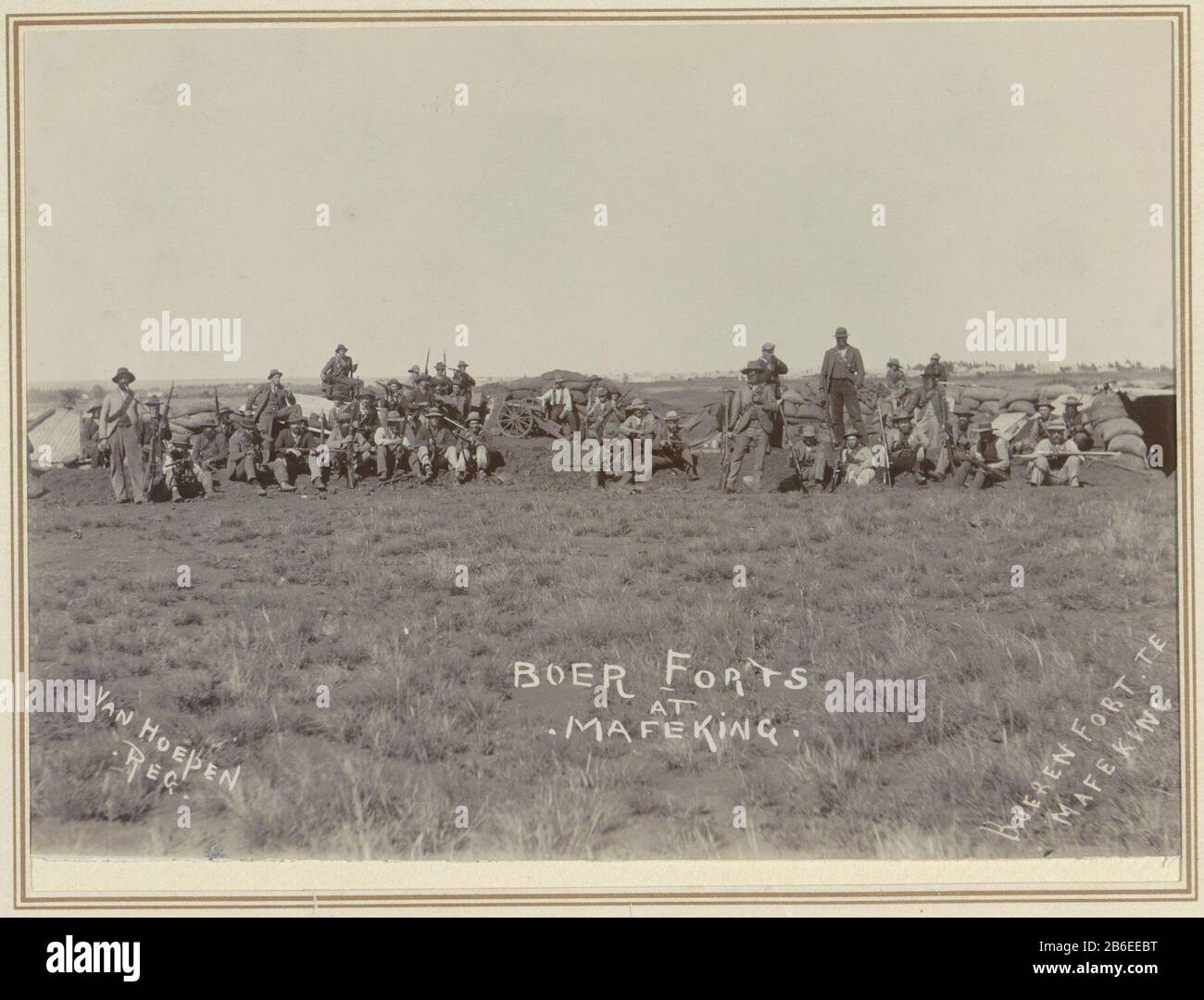 Farmers in their positions to Mafeking Boer forts at Mafeking Boer Fort to Mafeking (title object) Part of album with recordings of the Second Boer War (1899-1902) . Manufacturer : photographer Jan van Hoepen (listed property) Place Manufacture: Mafeking Dating: 1899 - 1900 Physical features: daylight gelatin silver print material: paper paper cardboard Technique: daylight gelatin silver print dimensions: mat: h 151 mm × W 204 mm Subject: defensive measures (military) (+ land forces) Second Boer War (1899-1902) Where: Mafeking Stock Photo