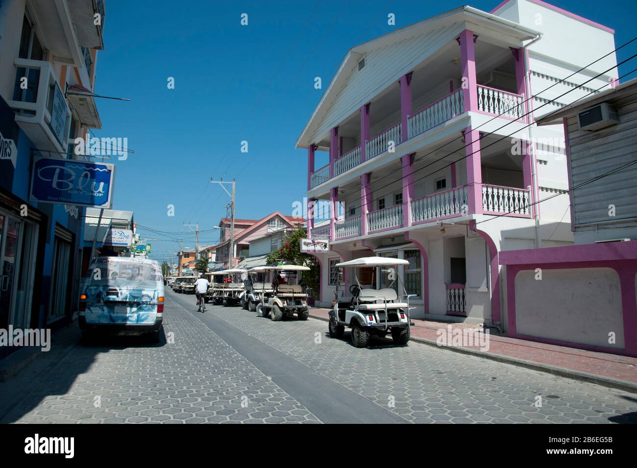 Black coral street with golf carts, San Pedro, Ambergris Caye, Corozal