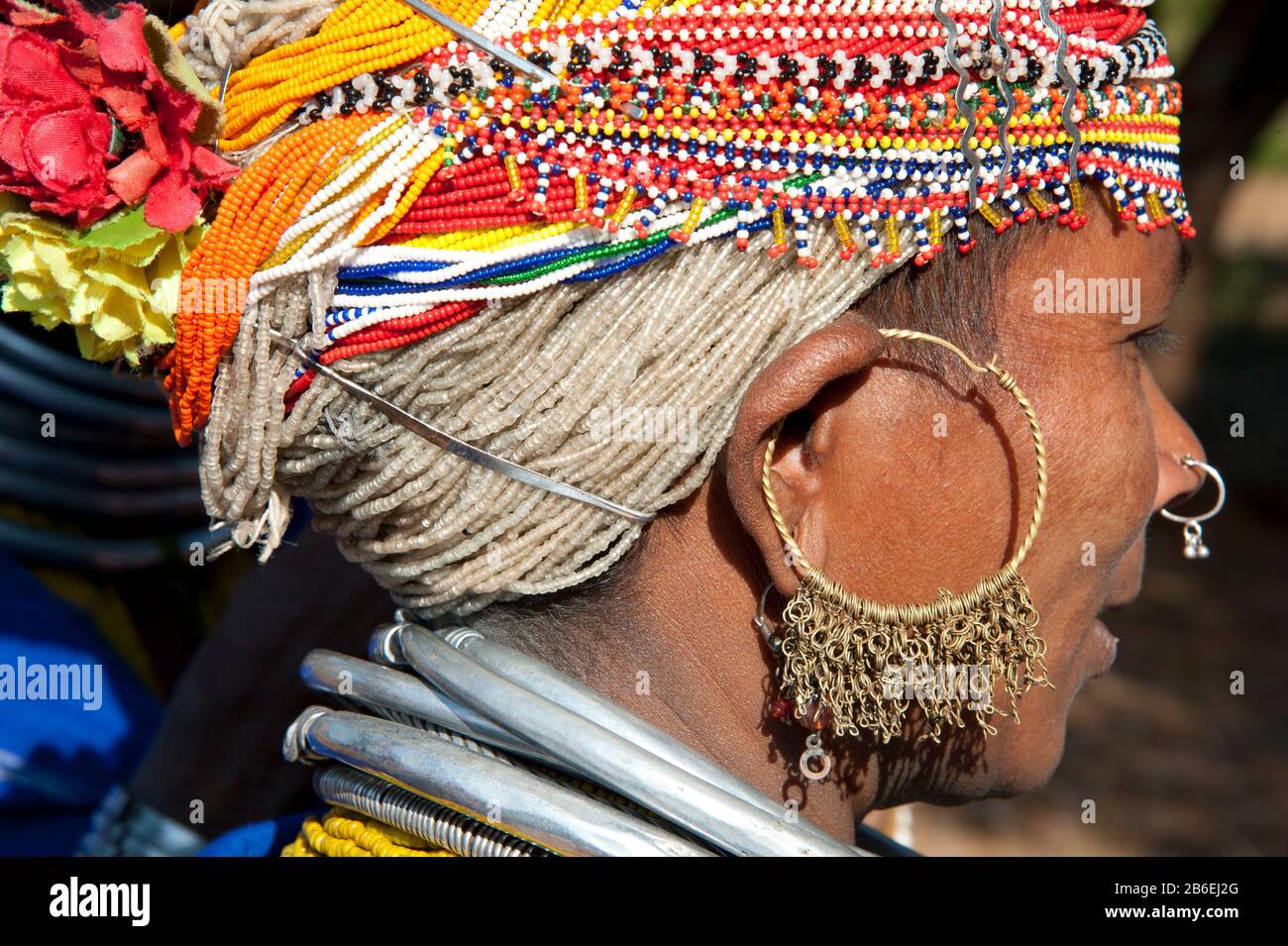 Bonda tribal women are known for their large earrings and elaborate beaded clothing, Onukudelli, Orissa, India Stock Photo