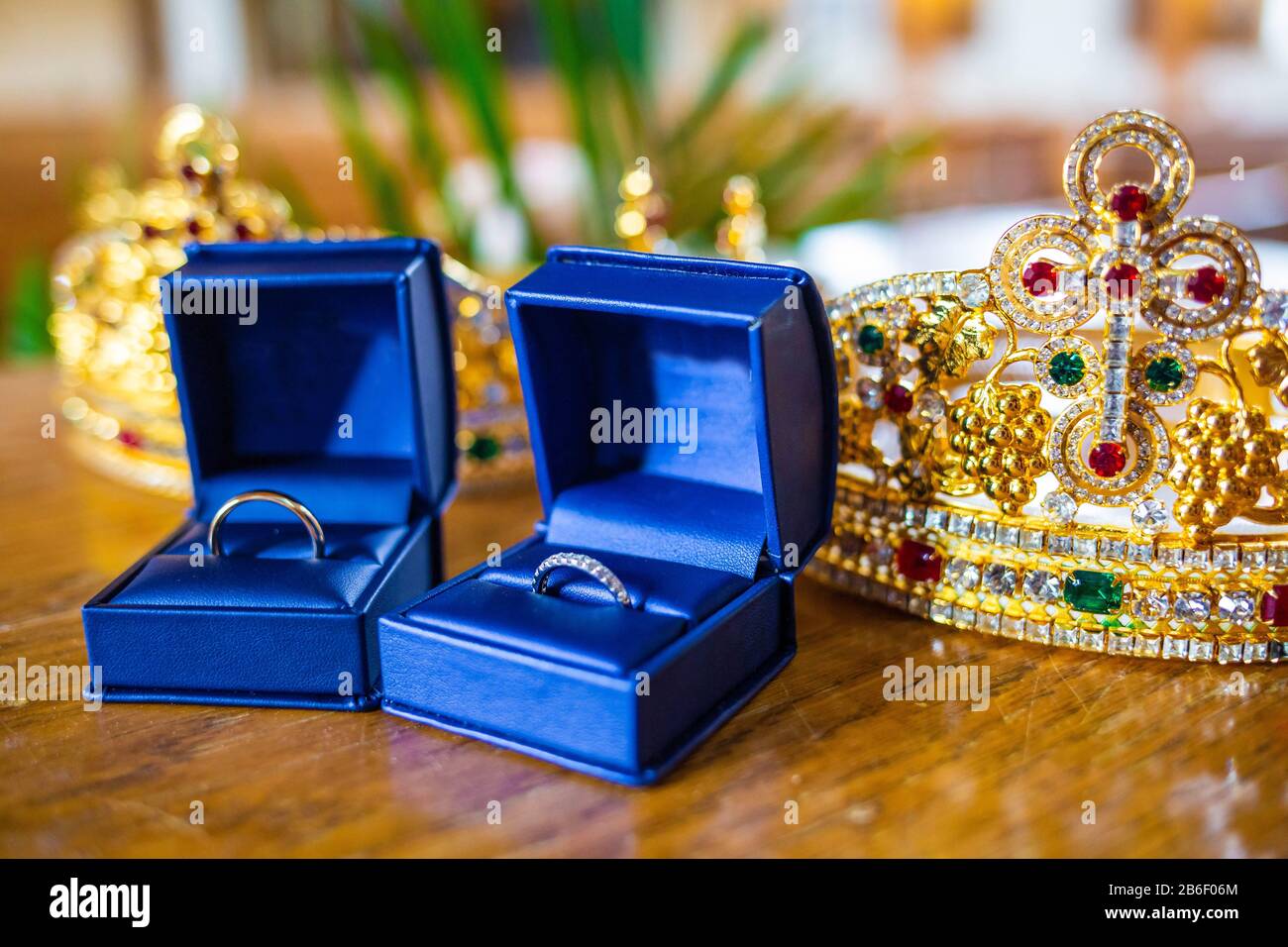 Pair of wedding rings in cases with holy crowns orthodox wedding