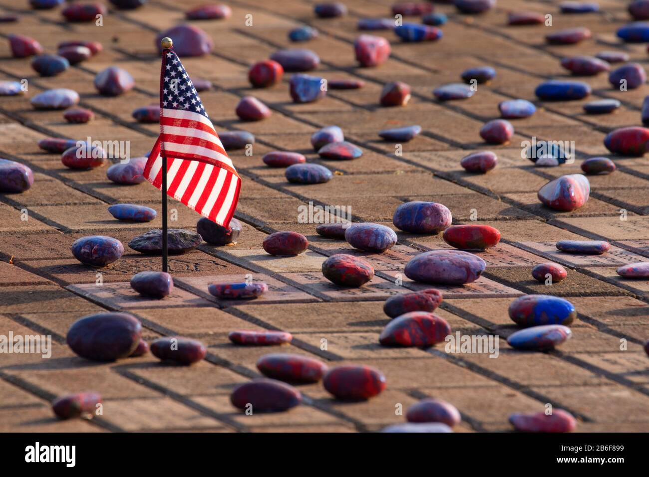 American flag with art rocks, David Dewett Veterans Memorial, Coos County, Oregon Stock Photo