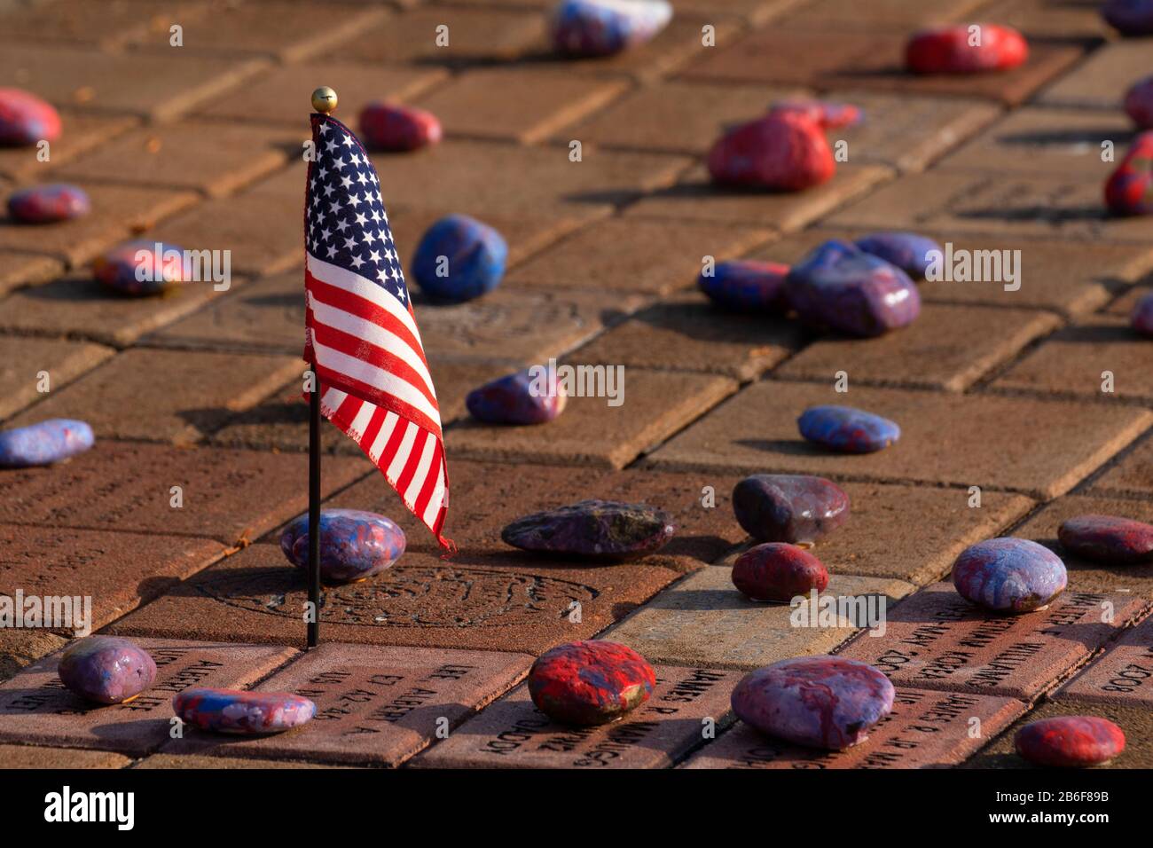 American flag with art rocks, David Dewett Veterans Memorial, Coos County, Oregon Stock Photo