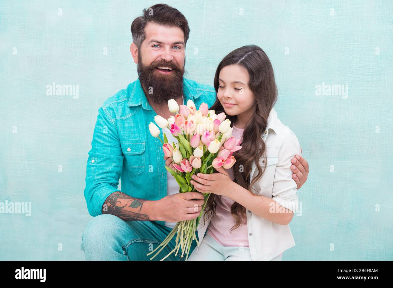 Every Moment With Her Is Precious Girl Greeting Dad With Fathers Day Womens Day Celebration Kid And Dad Prepare Flowers For Mothers Day Spring And Beauty Father And Daughter Happy Family Day