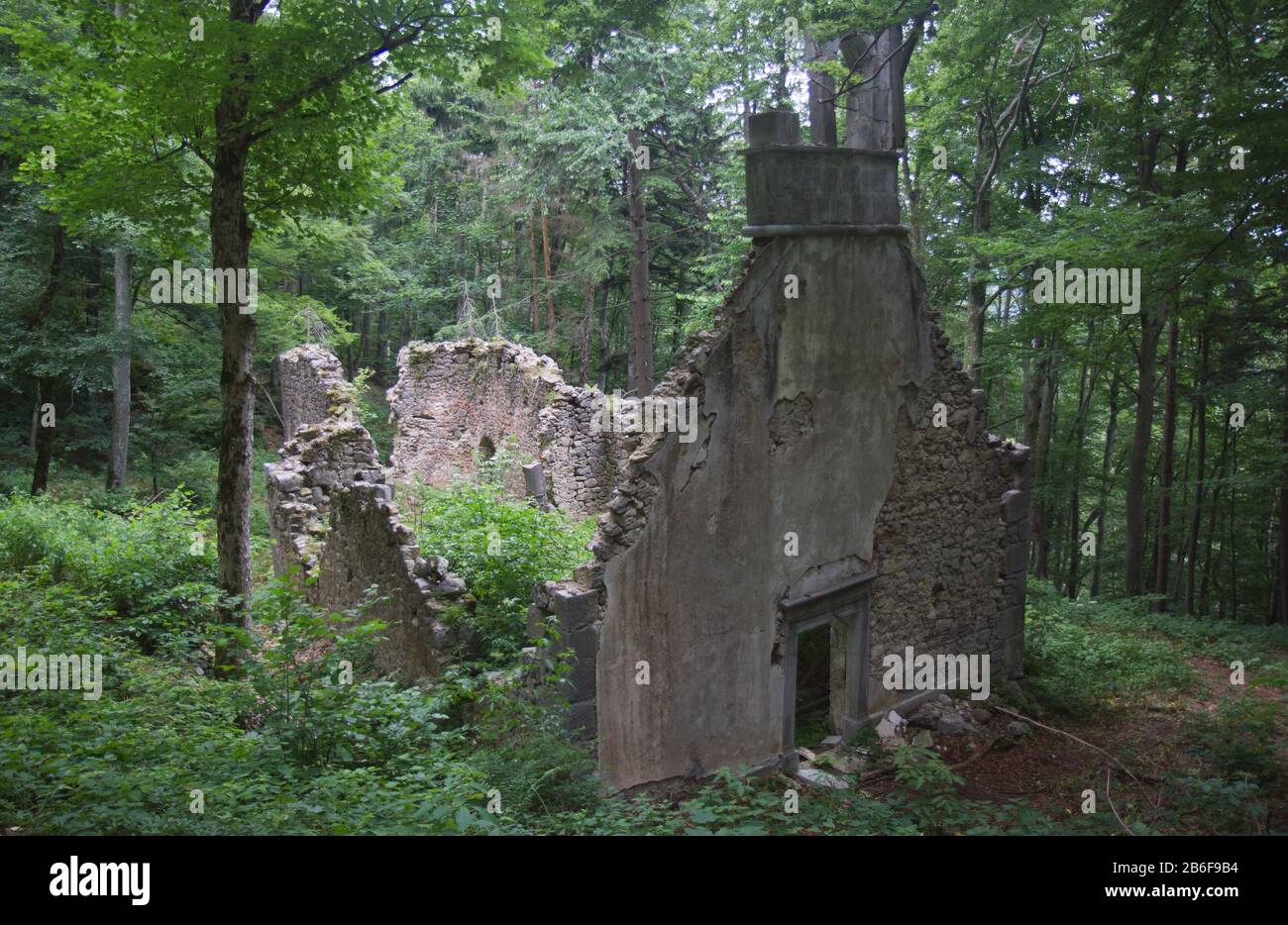 Saint Nicholas church ruin in the wood of Slivnica mountain, Slovenia, Central Europe Stock Photo