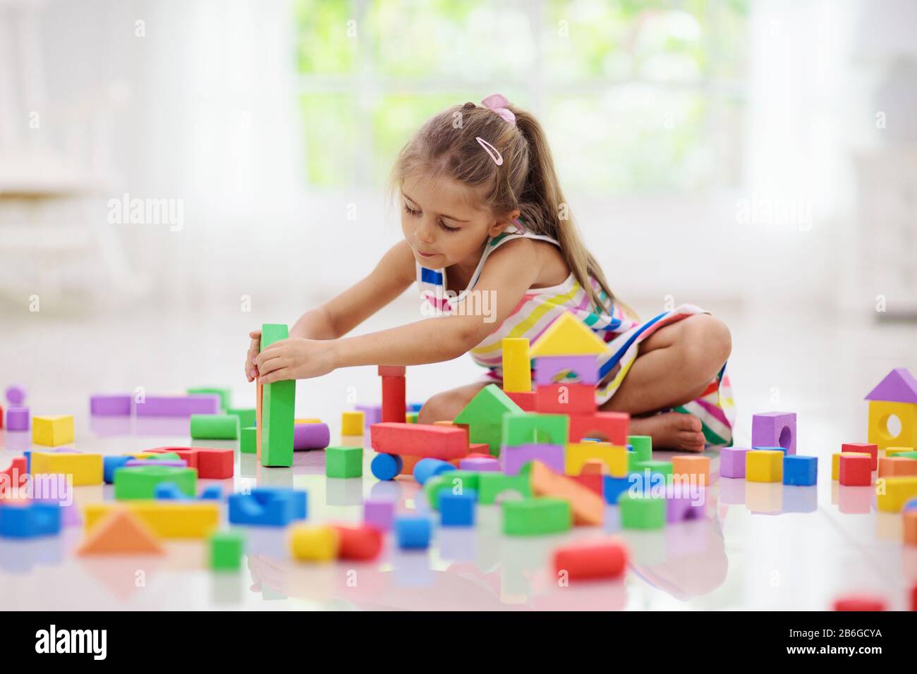 baby girl building blocks