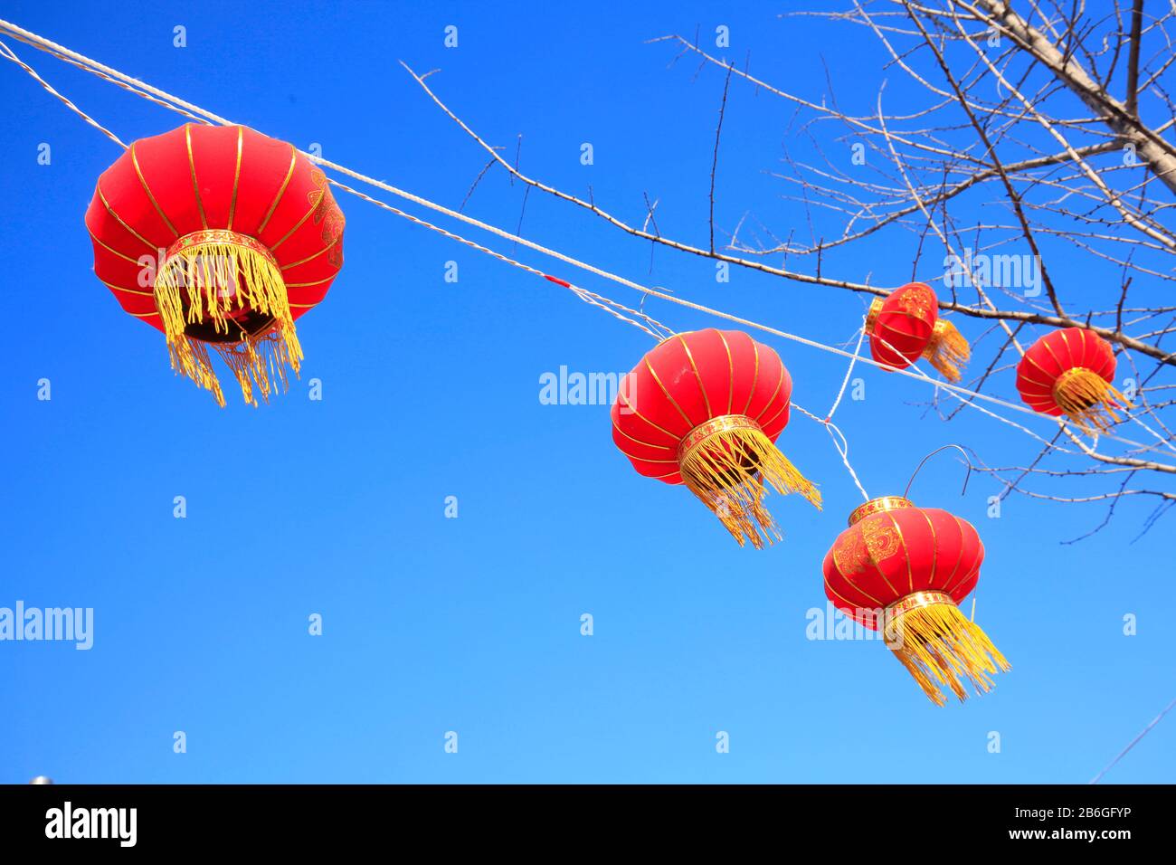 Glowing red lanterns hang hi-res stock photography and images - Alamy