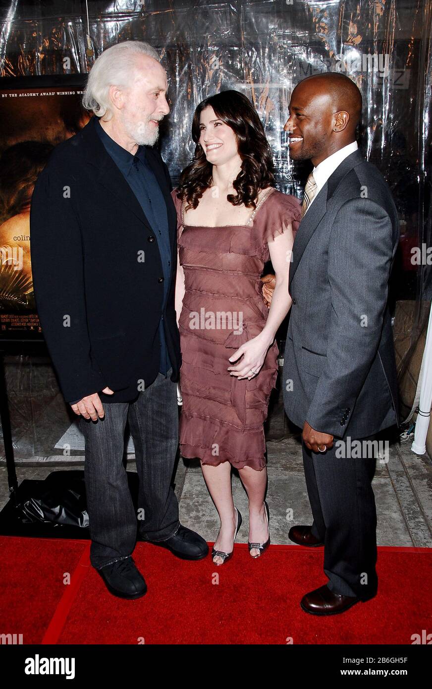 Director Robert Towne chats wid Idina Menzel and Taye Diggs at the Los Angeles Premiere of 'Ask The Dust' held at the Egyptian Theater in Hollywood, CA. The event took place on Thursday, March 2, 2006. Photo by: SBM / PictureLux All Rights Reserved - File Reference #33984-299SBMPLX Stock Photo