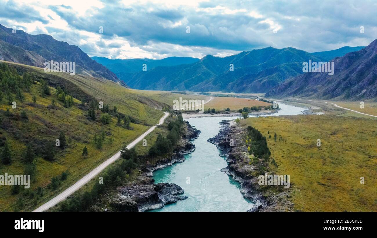 Mountain turquoise river, rocky banks aerial view. Rugged Rea for Rafting Drone shooting. Katun River, Altai. Stock Photo