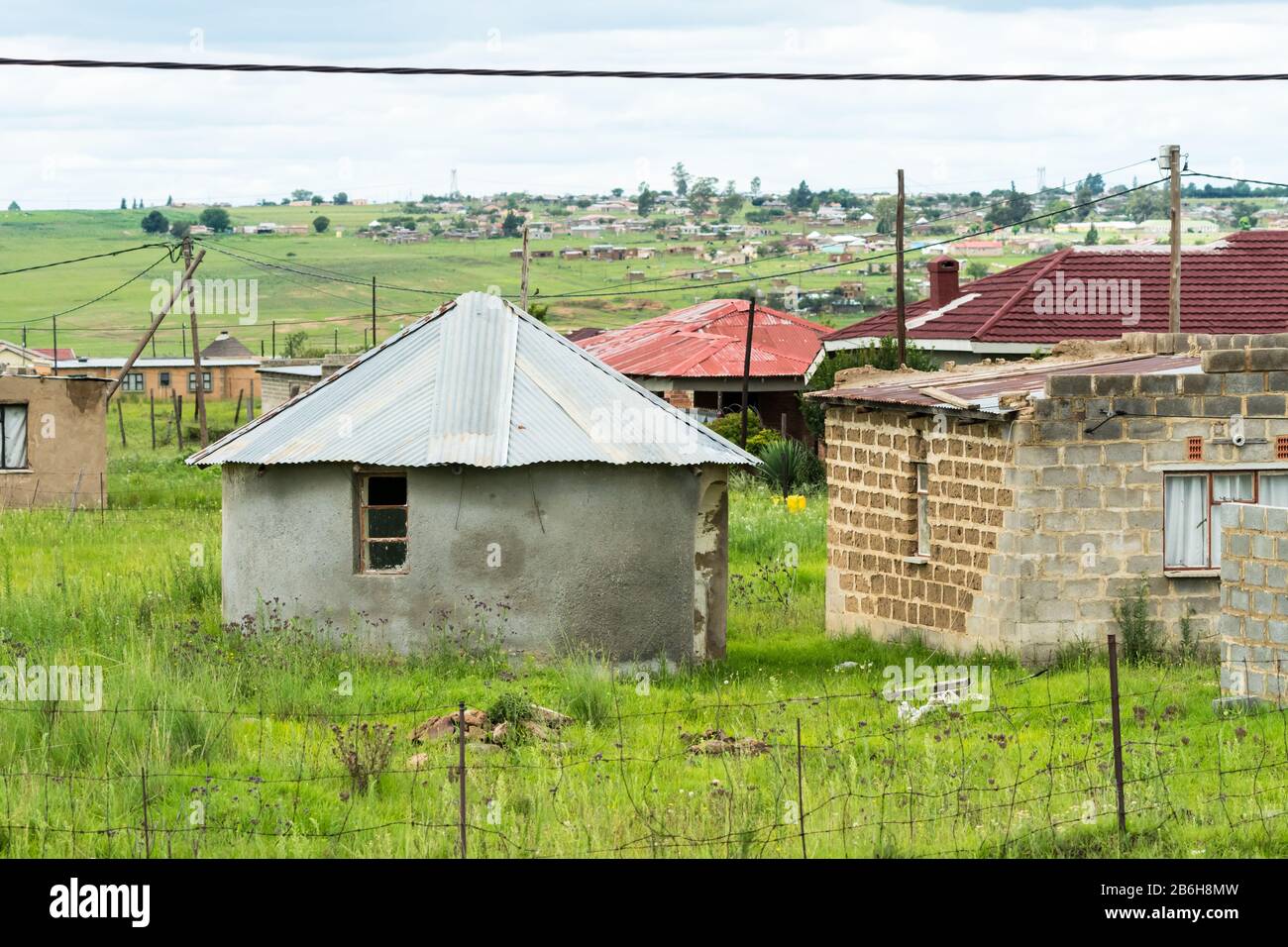 roughly constructed traditional rondawel or circular hut or house in a small rural town in Kwazulu Natal, South Africa Stock Photo