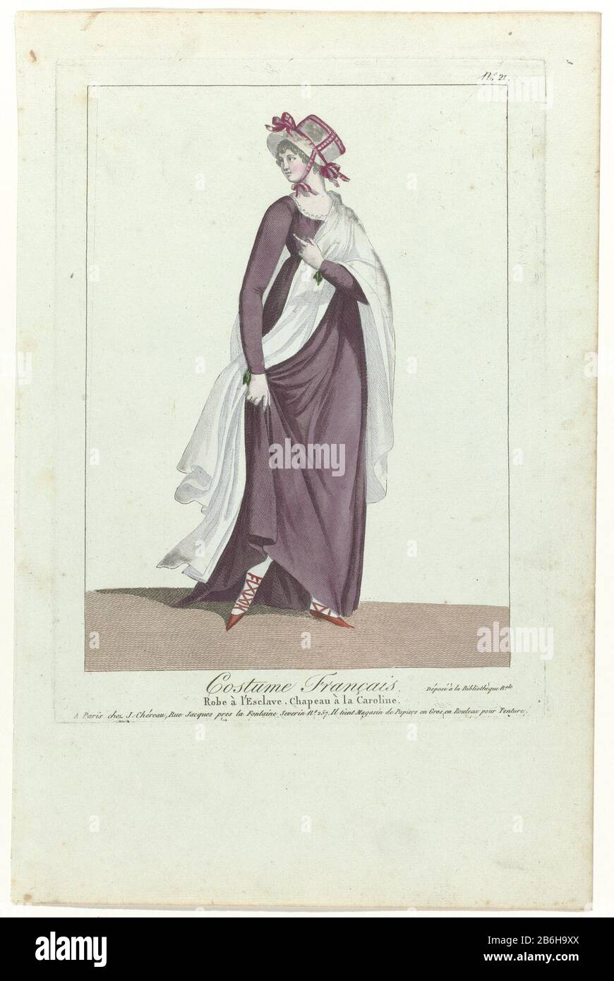 Woman walking to the right, wearing a dress with long sleeves and tow "Robe  à l'Esclave. With the right hand she lifts the skirt on. On the head a hat  'chapeau à