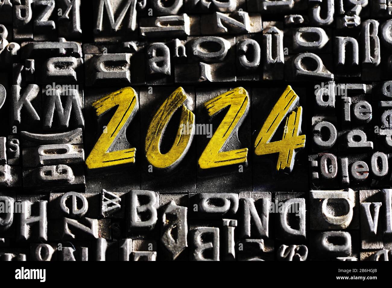 Old lead letters with golden writing show the word 2025, Germany Stock