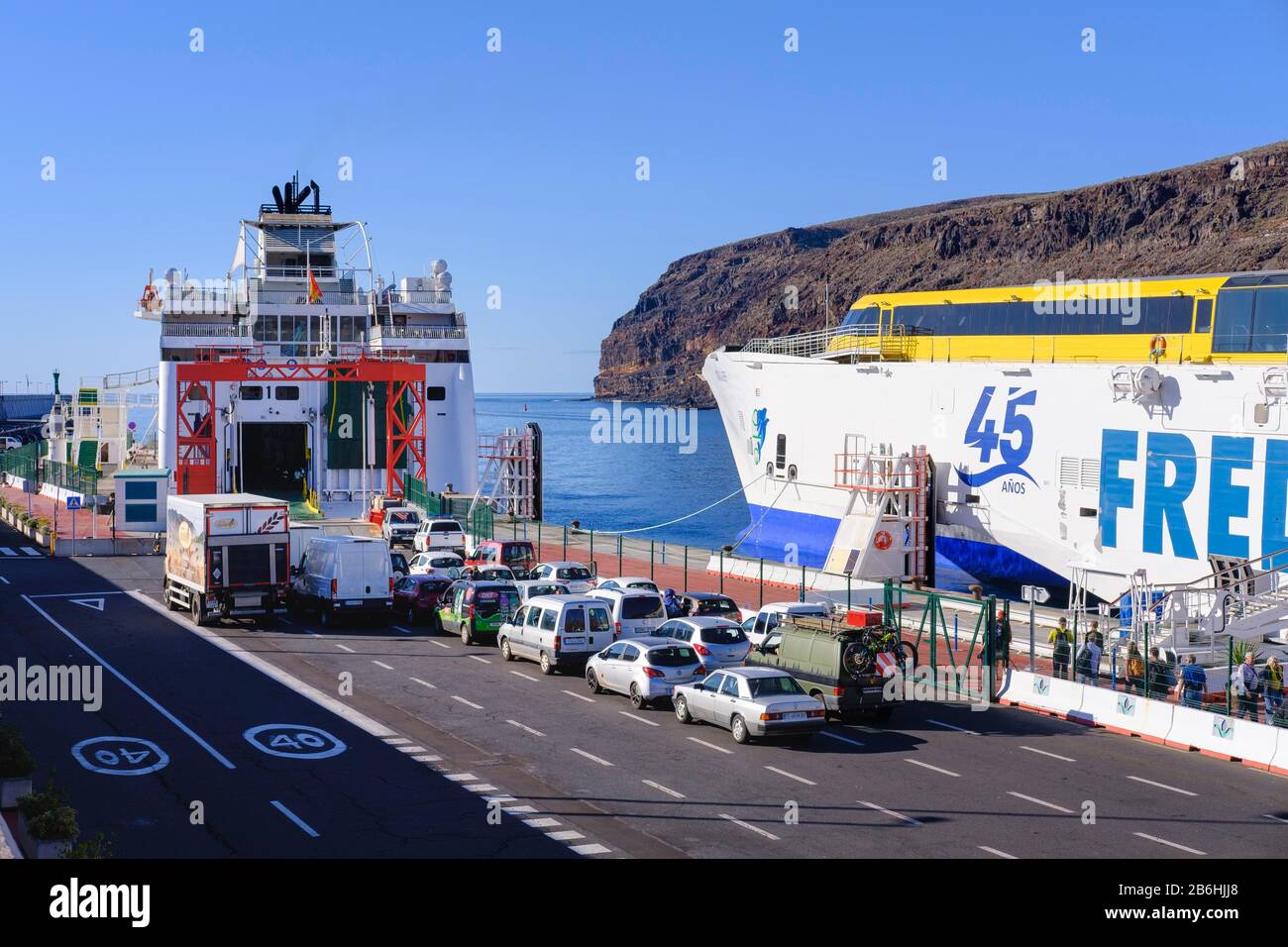 Waiting cars in front of car ferry in the port of San Sebastian de la Gomera, La Gomera, Canary Islands, Spain Stock Photo