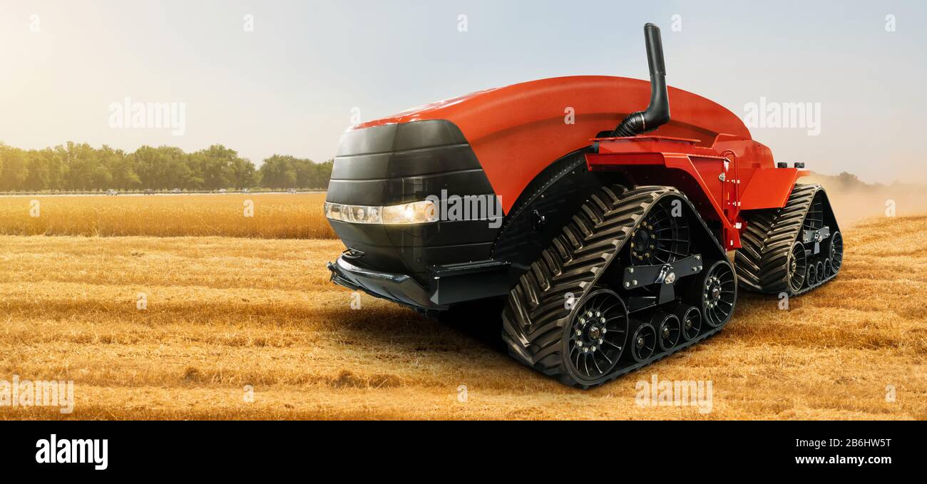 Autonomous tractor working on the field. Smart farming Stock Photo - Alamy