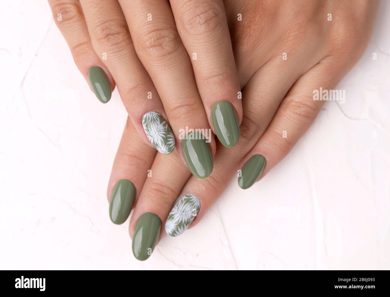 Beautiful womans hands with spring summer floral nail design Stock Photo -  Alamy