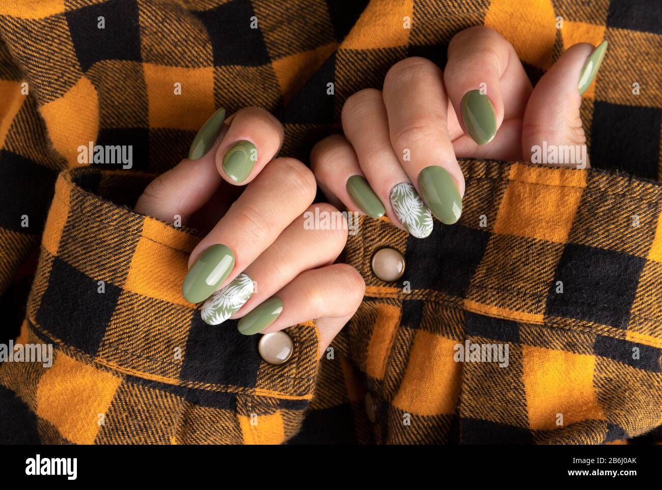 Beautiful womans hands with spring summer floral nail design Stock Photo -  Alamy
