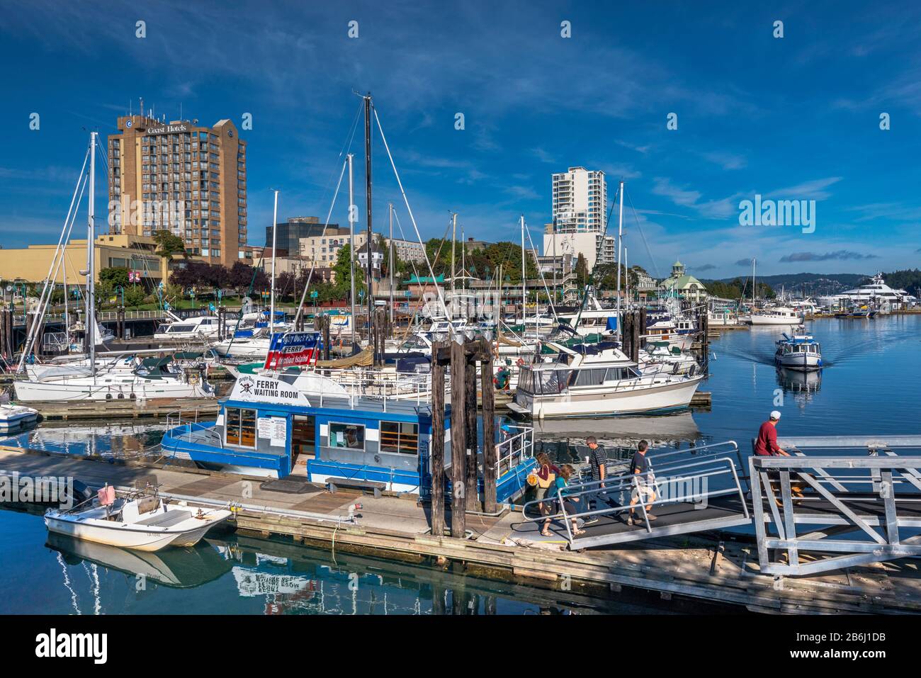Boats at marina in Nanaimo Harbour, downtown buildings, Nanaimo, Vancouver Island, British
