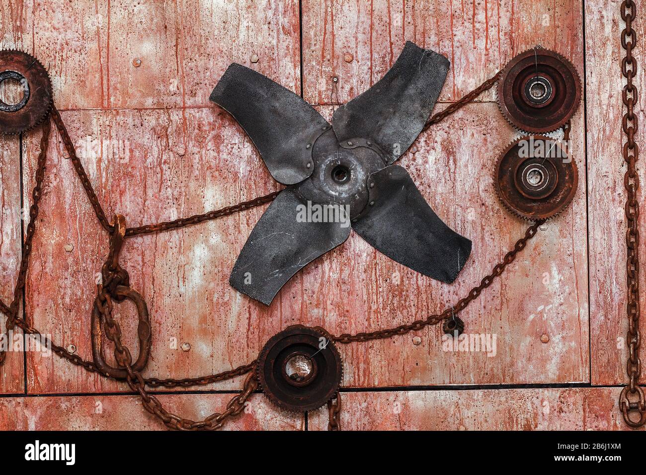 Rusty metal ship texture with rivets as steam punk background with screw Stock Photo