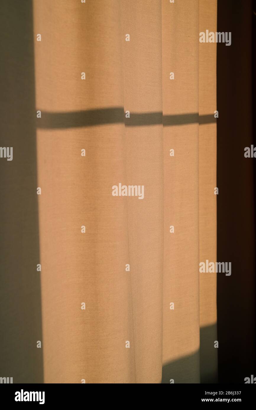 Evening sunlight falls on the curtains Stock Photo