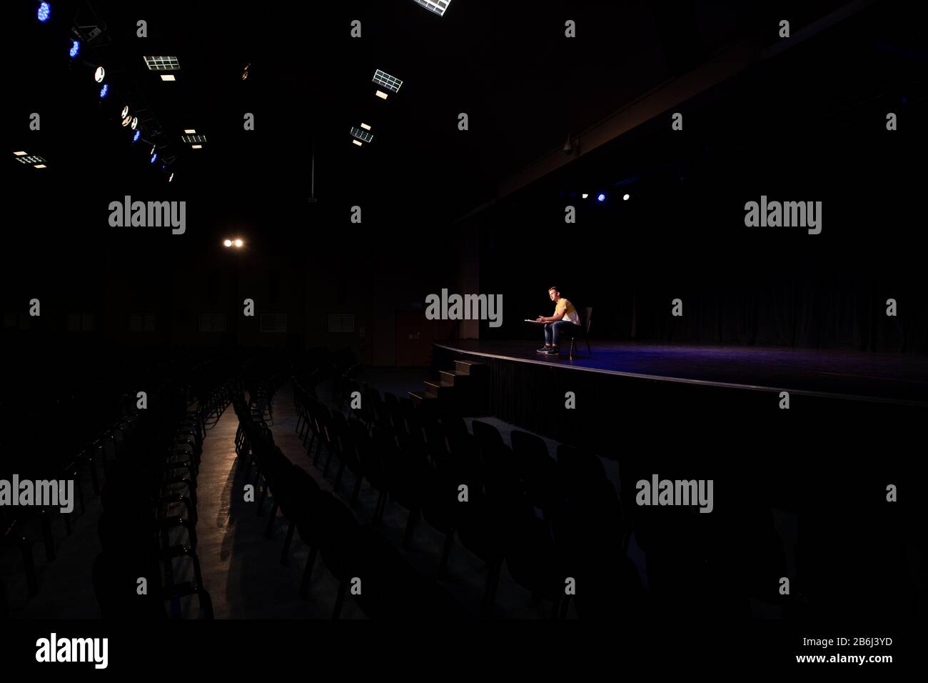 Distant view of student practicing at the theater Stock Photo