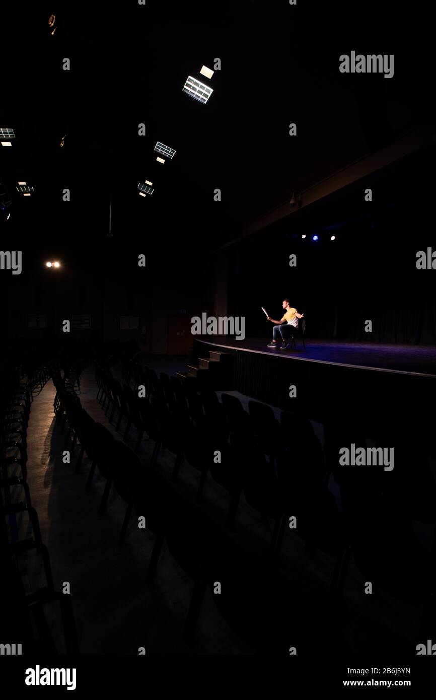 Distant view of student practicing at the theater Stock Photo