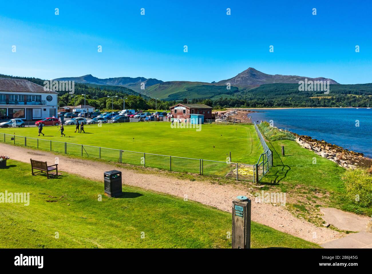 View towards Goat Fell with mini across Brodick Bay with mini golf from Brodick in Arran Argyll & Bute Scotland UK Stock Photo