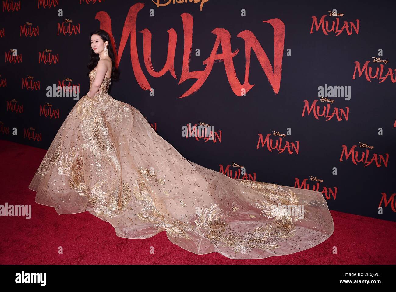 HOLLYWOOD, CA - MARCH 09: Yifei Liu attends the premiere of Disney's 'Mulan' at the El Capitan Theatre on March 09, 2020 in Hollywood, California. Stock Photo