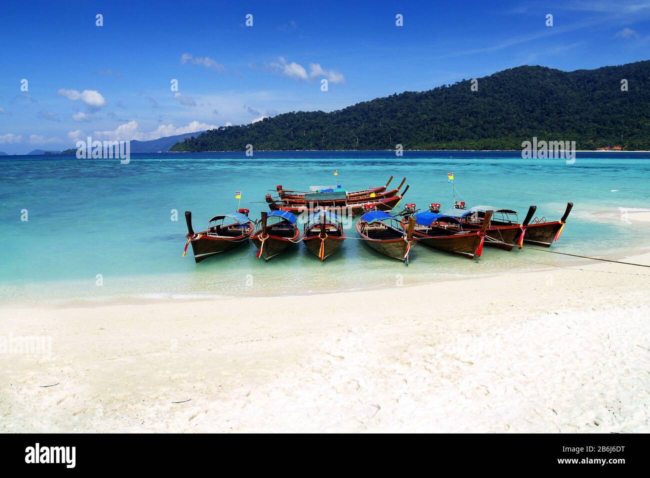 long tail boat, in white sand beach in andaman sea Stock Photo