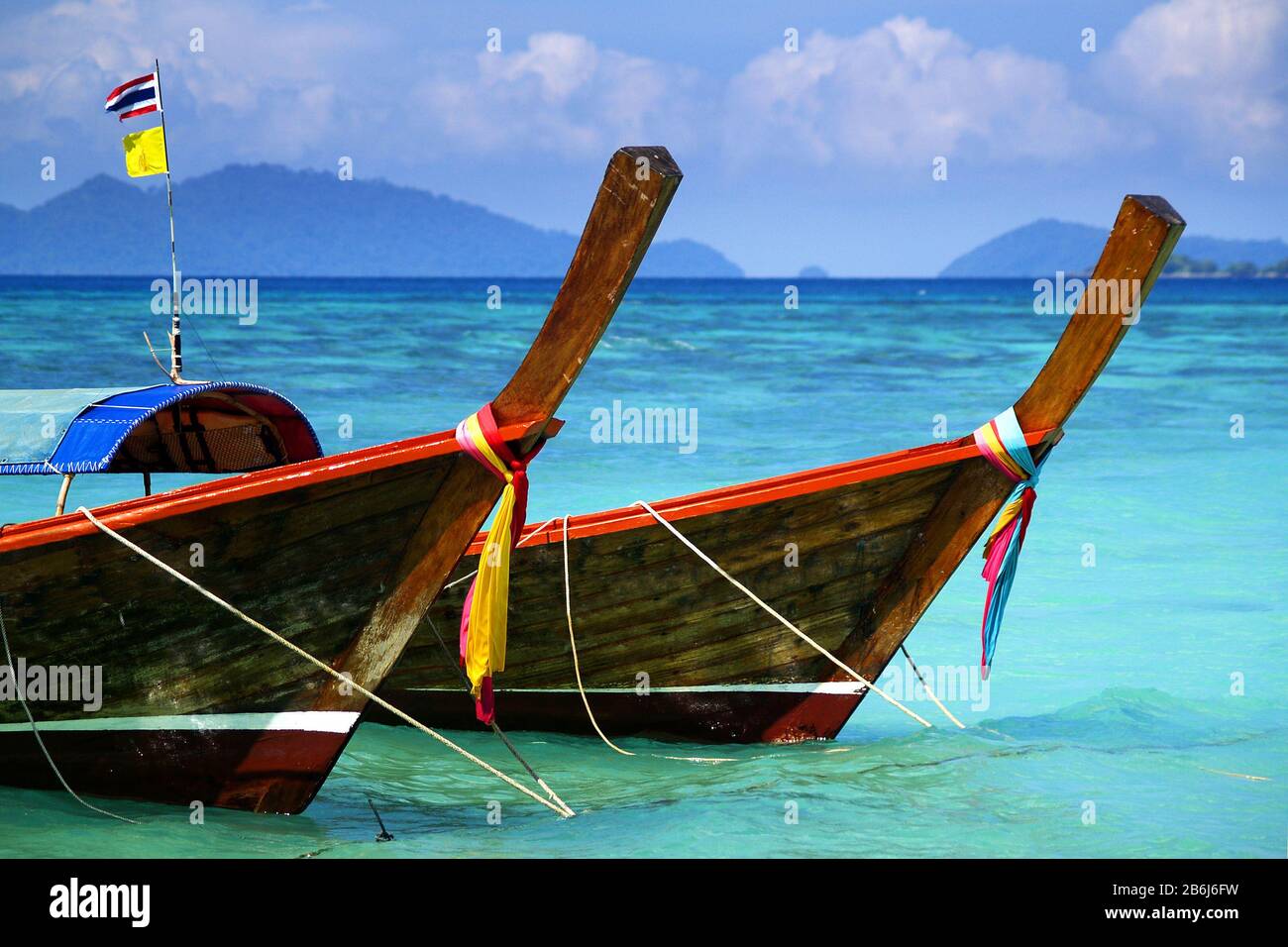 long tail boat, in white sand beach in andaman sea Stock Photo